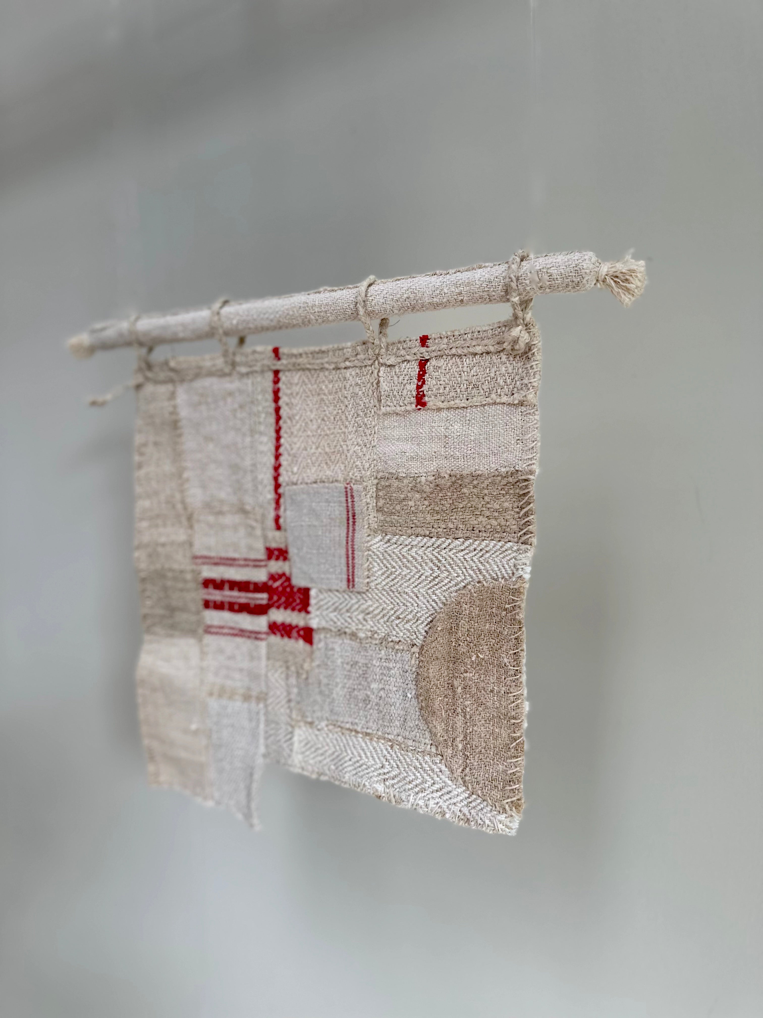 'Trove of Red' Miniature grain-sack patched art on bar